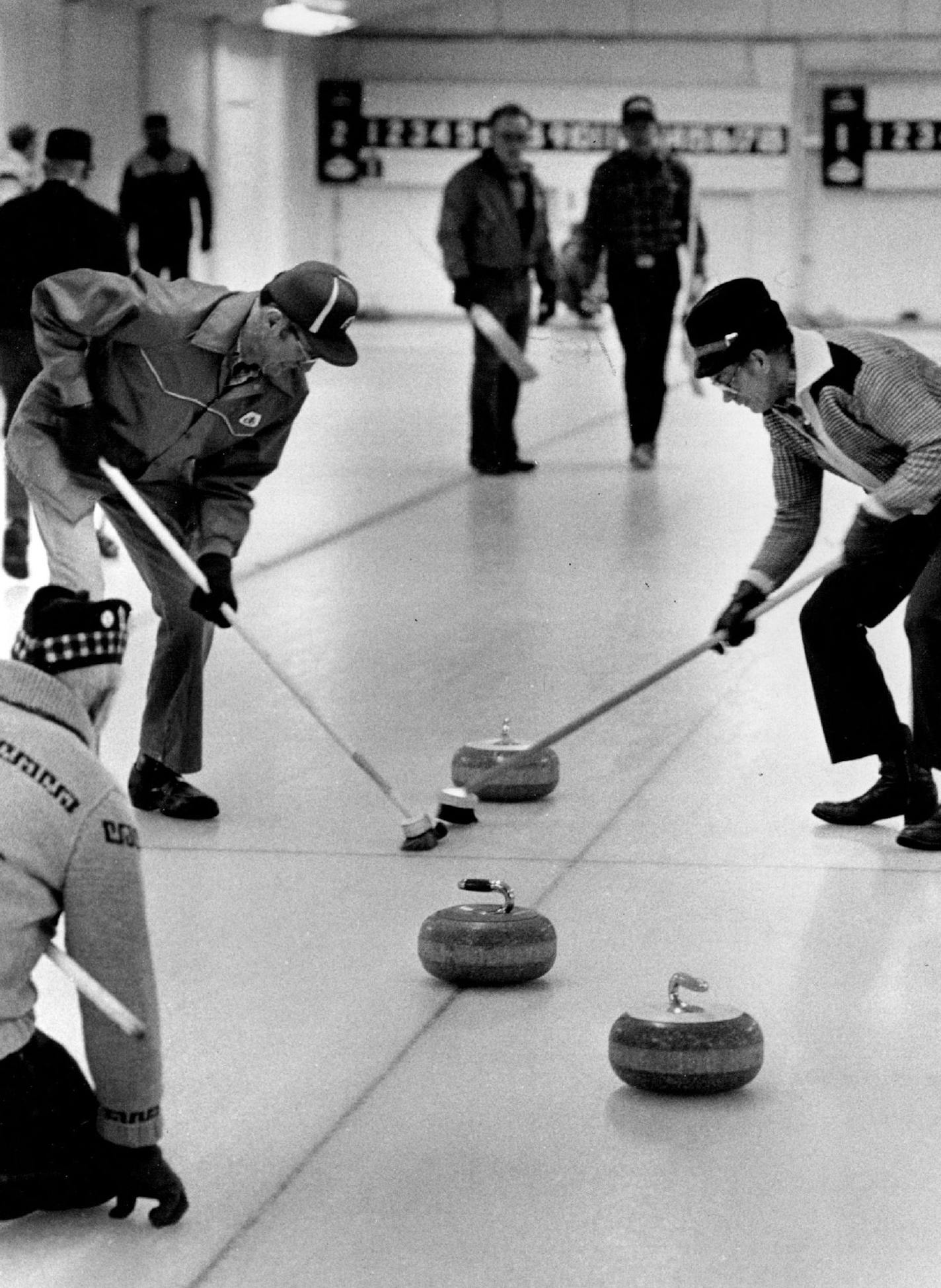 January 24, 1985 Action at the Heather curling club, Mapleton Mn. February 2, 1985 Curlers swept a path for a stone at the Heather Curling club. Steve Schluter, Minneapolis Star Tribune