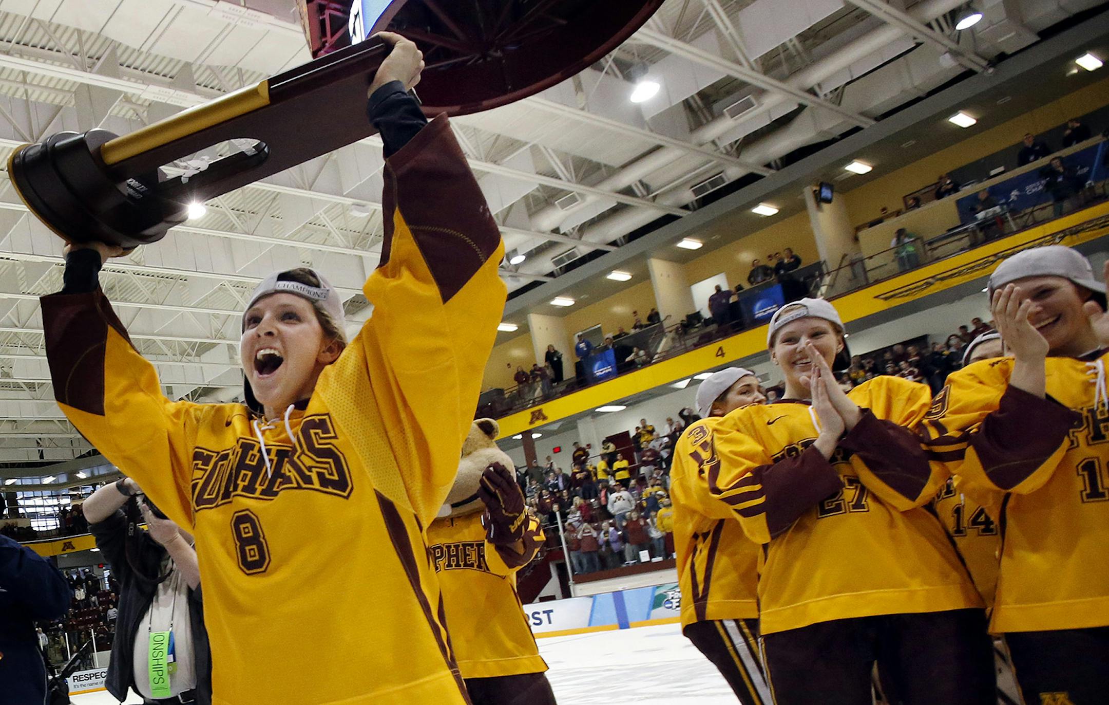 Minnesota’s Amanda Kessel celebrated the National Championship and a perfect season after the Gophers’ victory over Boston University on Sunday.
