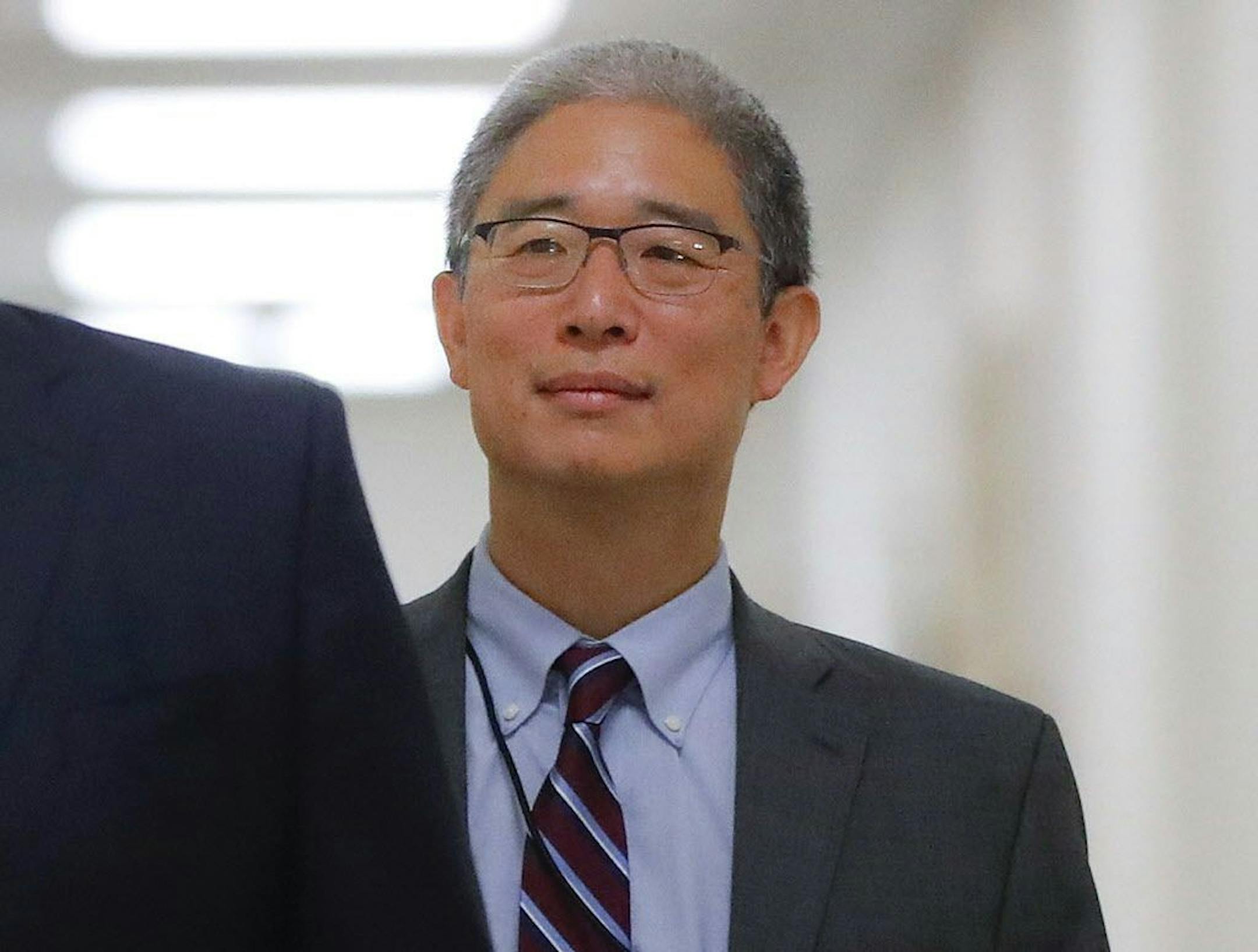In this Aug. 28, 2018, file photo, Justice Department official Bruce Ohr arrives for a closed hearing of the House Judiciary and House Oversight committees on Capitol Hill in Washington. A former British spy told Ohr, a senior Justice Department lawyer, at a breakfast meeting on July 30, 2016, that Russian intelligence believed it had Donald Trump "over a barrel," according to multiple people familiar with the encounter.