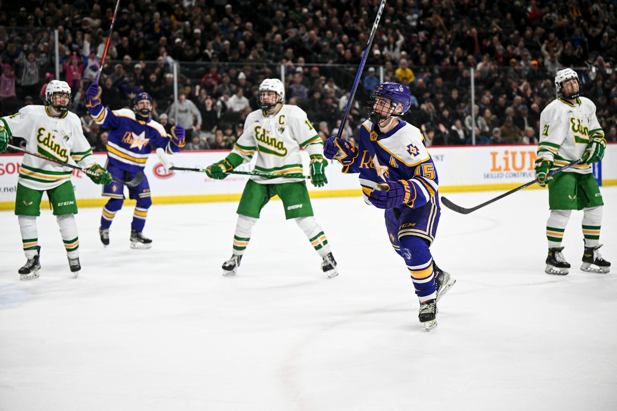 Cretin-Derham Hall forward Attila Lippai (15) reacts after scoring a goal against Edina during the first period.