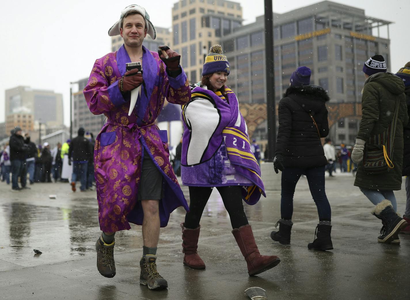 Jimmy Cosgrove wore a bathrobe to Sunday's playoff game with Ruthie Kinney. They live in Savage. ] JEFF WHEELER &#xef; jeff.wheeler@startribune.com The Minnesota Vikings faced the New Orleans Saints in an NFC divisional playoff game Sunday afternoon, January 14, 2018 at U.S. Bank Stadium in Minneapolis.