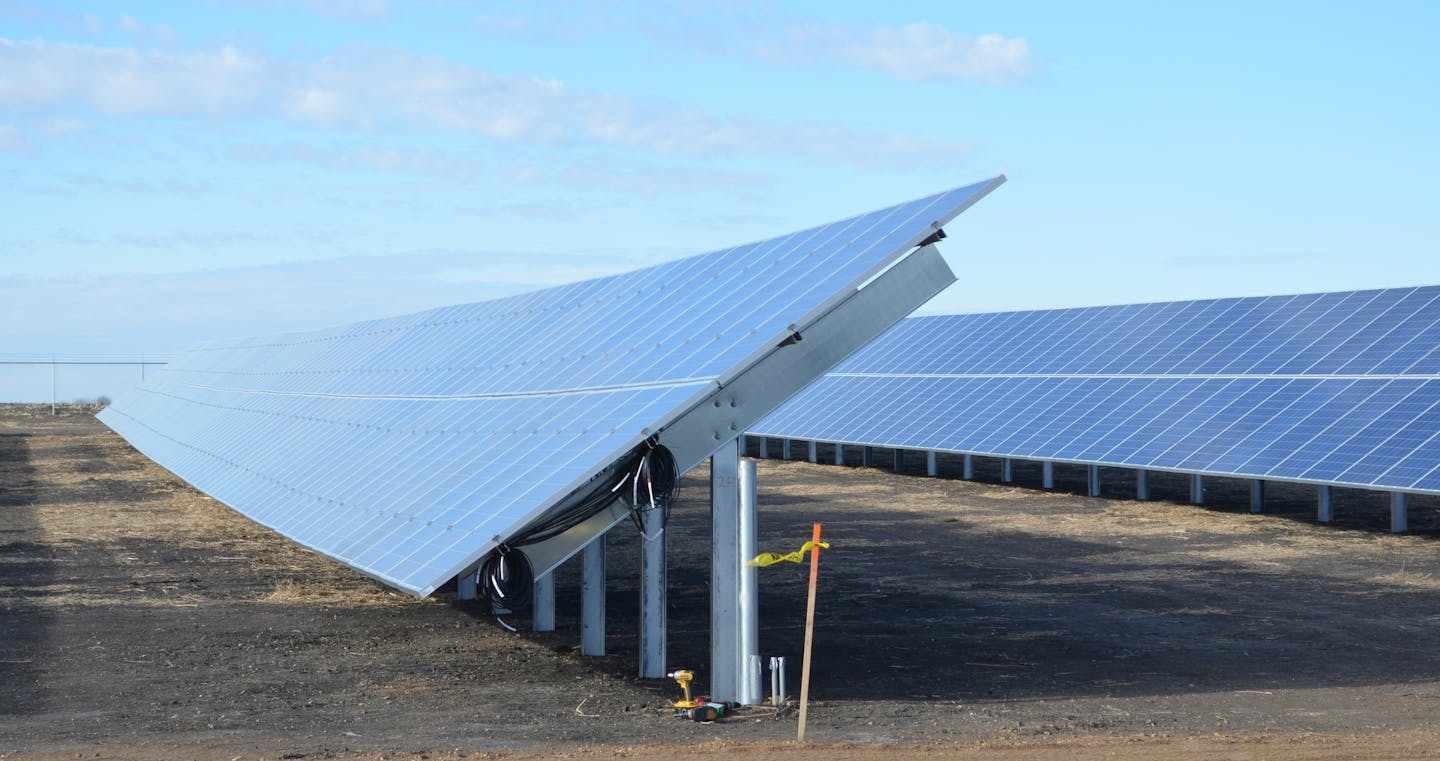 Photo credit: Brad Wilson/Ecos Energy The largest solar-electric installation in Minnesota sits on a field outside Slayton, Minn., 180 miles southwest of the Twin Cities. The project developer, Ecos Energy, based in Minneapolis, plans to flip on the switch on Friday Jan. 4, 2012. The solar array has 7,040 solar panels in 32 rows and is the largest in Minnesota, with an output of 2 megawatts of electricity, the equivalent of that used by 250 homes. The power is being sold to Xcel Energy. The $7 m