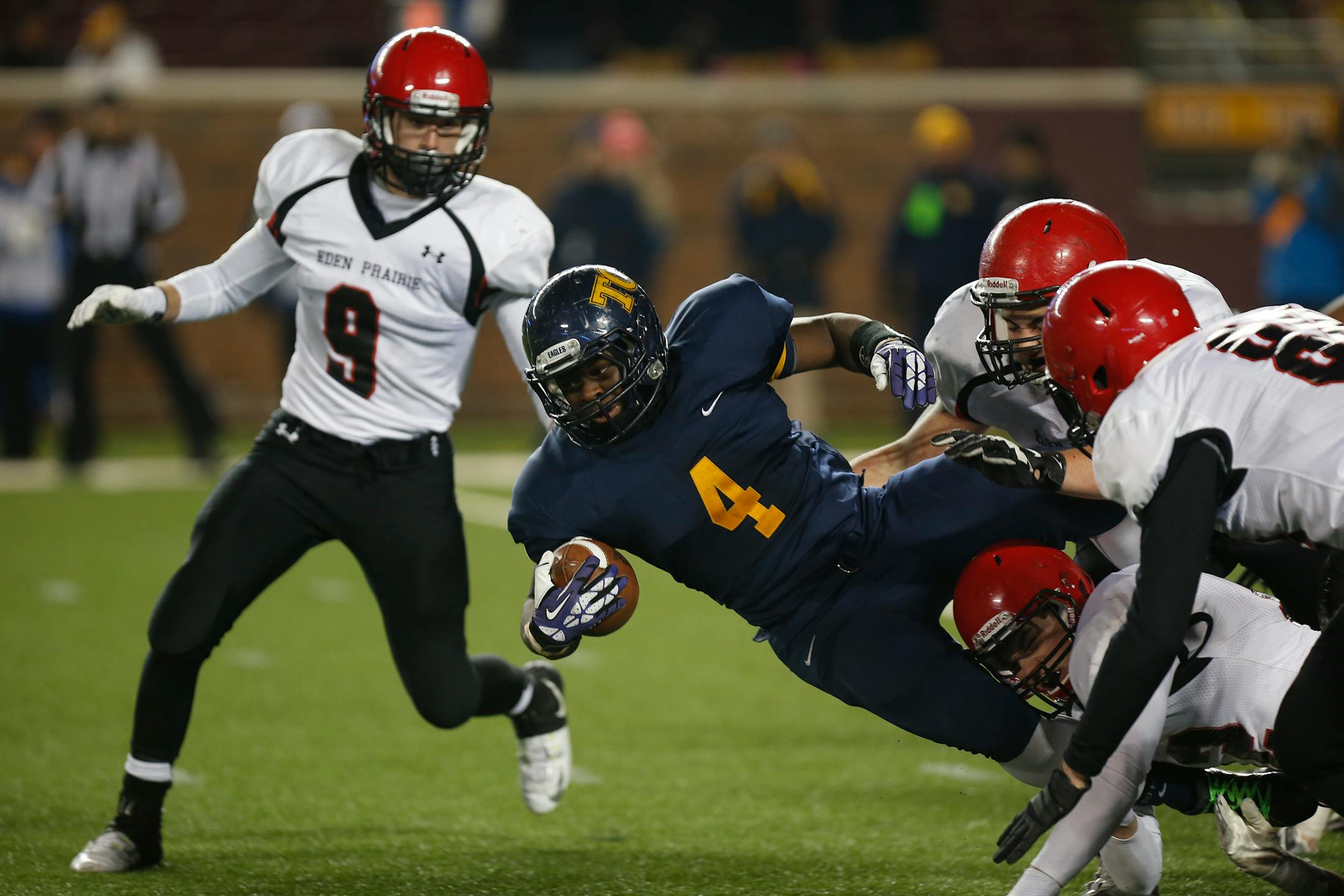 A rematch of last season's Class 6A championship game between Eden Prairie and Totino-Grace, pictured, remains scheduled for 7 p.m. Saturday, Aug. 22, 2015.