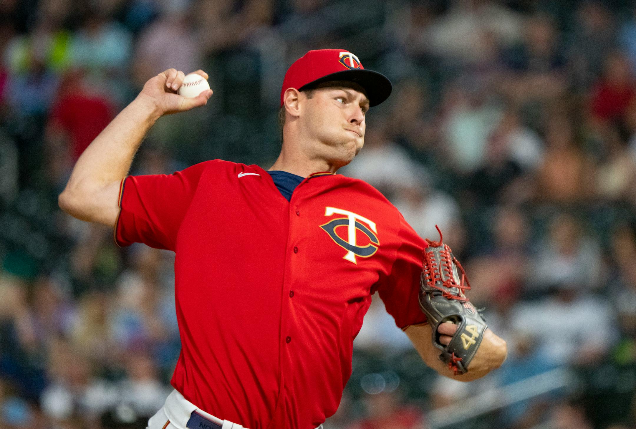 Minnesota Twins relief pitcher Trevor Megill (58) throws out a pitch.