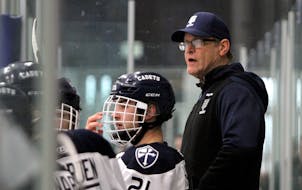 Mike Randolph is tied for the state record in boys hockey coaching victories with 707.
