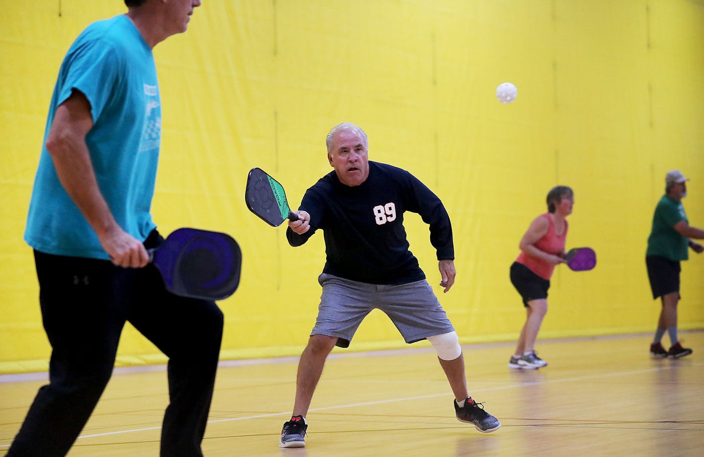 The Burnsville Community Center was brimming with pickle ball games, including Darrell Goring, who returned a shot as teammate Bill Gustafson, left, looked on Thursday, March 21, 2019, in Burnsville, MN.] DAVID JOLES &#x2022;david.joles@startribune.com The senior citizen-friendly sport of pickleball is causing controversy in Apple Valley, where residents whose homes abut a popular city pickleball court say the noisy sport has been making them crazy for years. The constant 'ping' of the plastic b