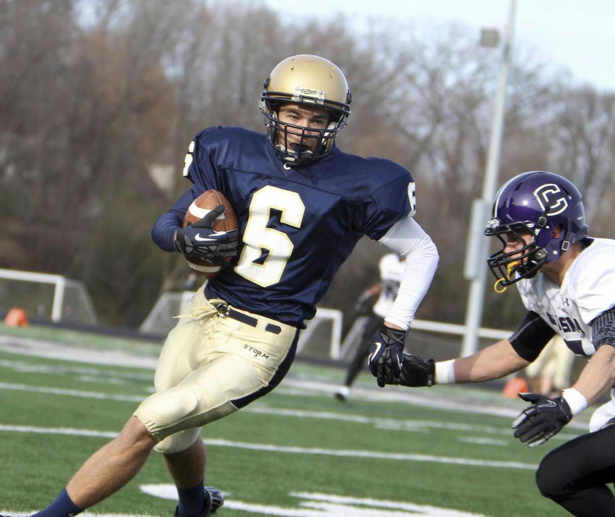 Chanhassen's Jared Lea (6) made two touchdowns after completing passes during the 5A playoff game against Chaska at Chanhassen High School October 27, 2012. Chanhassen won, 20-14.