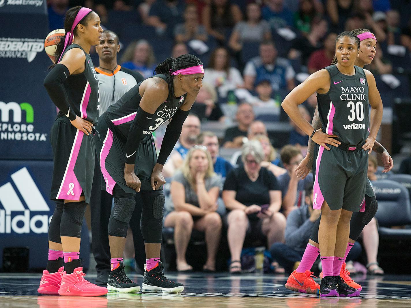 From left, the Lynx's Maya Moore, Sylvia Fowles, Tanisha Wright and Seimone Augustus showed their frustration during the fourth quarter as the Lynx lost 81-72 to the Seattle Storm at Target Center on Sunday.