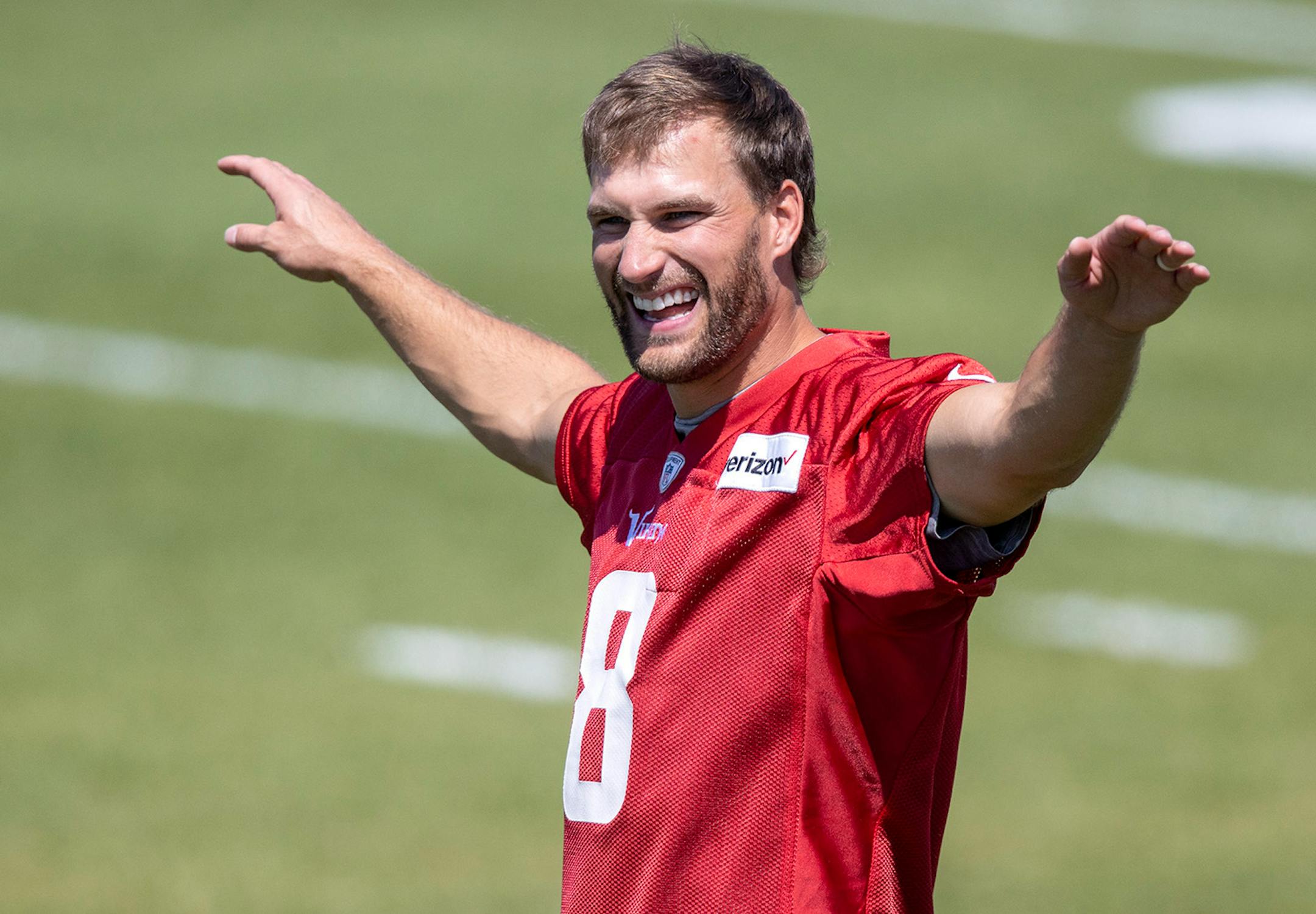 Minnesota Vikings quarterback Kirk Cousins (8) stretched during practice.