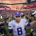 Minnesota Vikings quarterback Kirk Cousins (8) is on his way out.