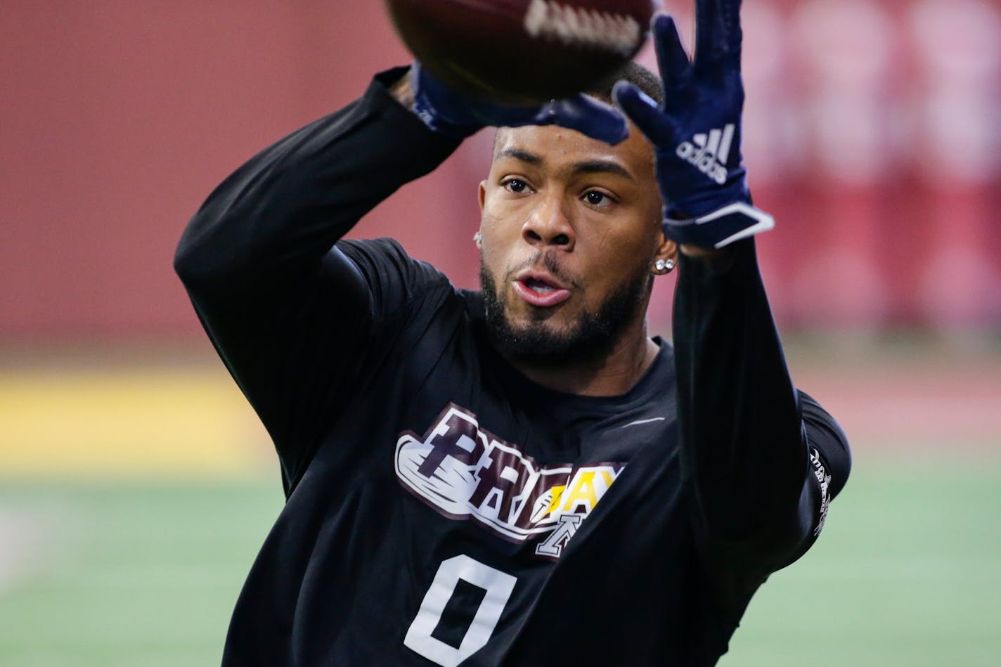 Minnesota wide receiver Rashod Bateman makes a catch during Minnesota NFL football Pro Day Thursday, April 1, 2021, in Minneapolis. (AP Photo/Andy Clayton- King)