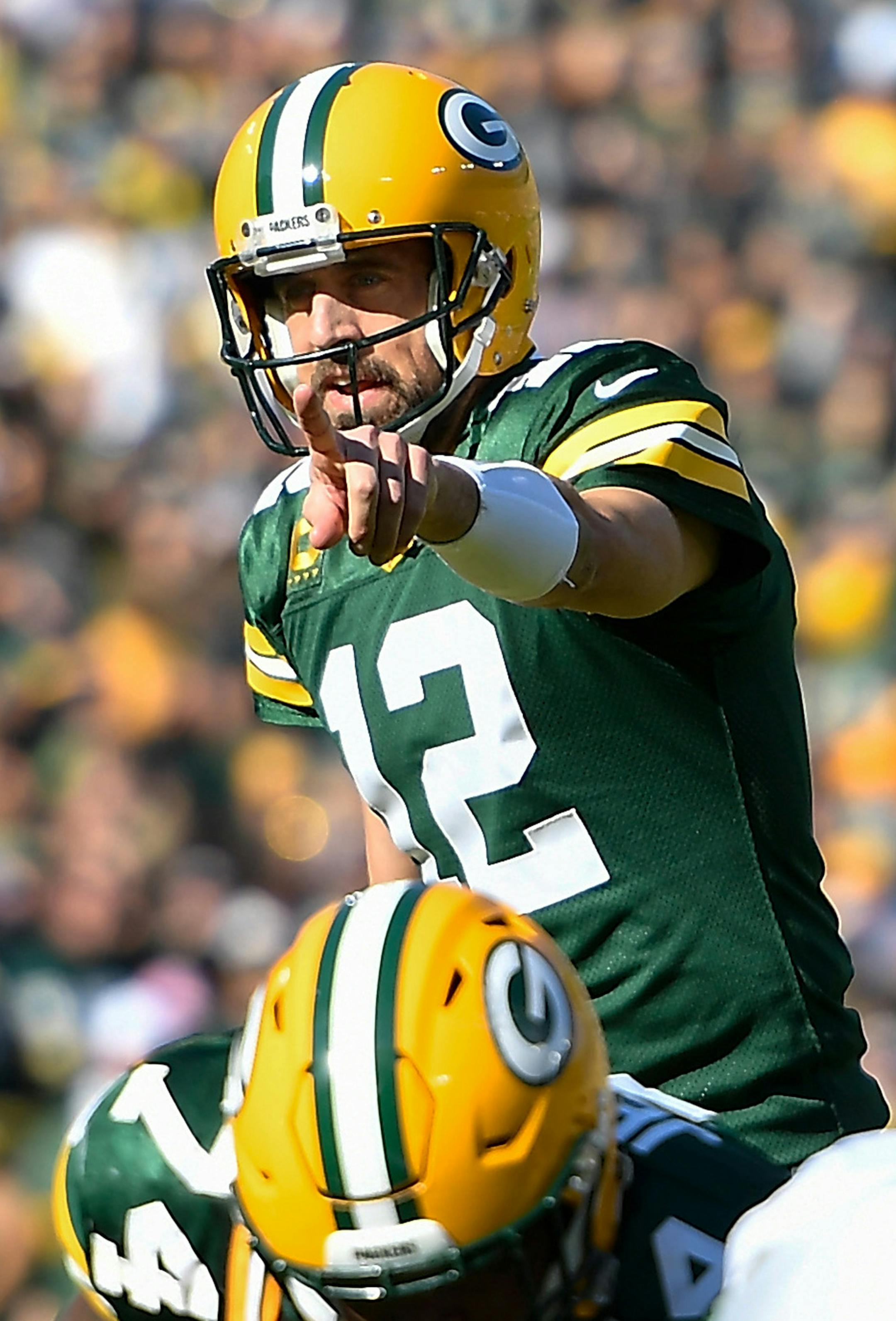 Aaron Rodgers #12 of the Green Bay Packers calls a play from the line of scrimmage in the second half against the Oakland Raiders at Lambeau Field on October 20, 2019 in Green Bay, Wisconsin. (Quinn Harris/Getty Images/TNS) ORG XMIT: 1470683