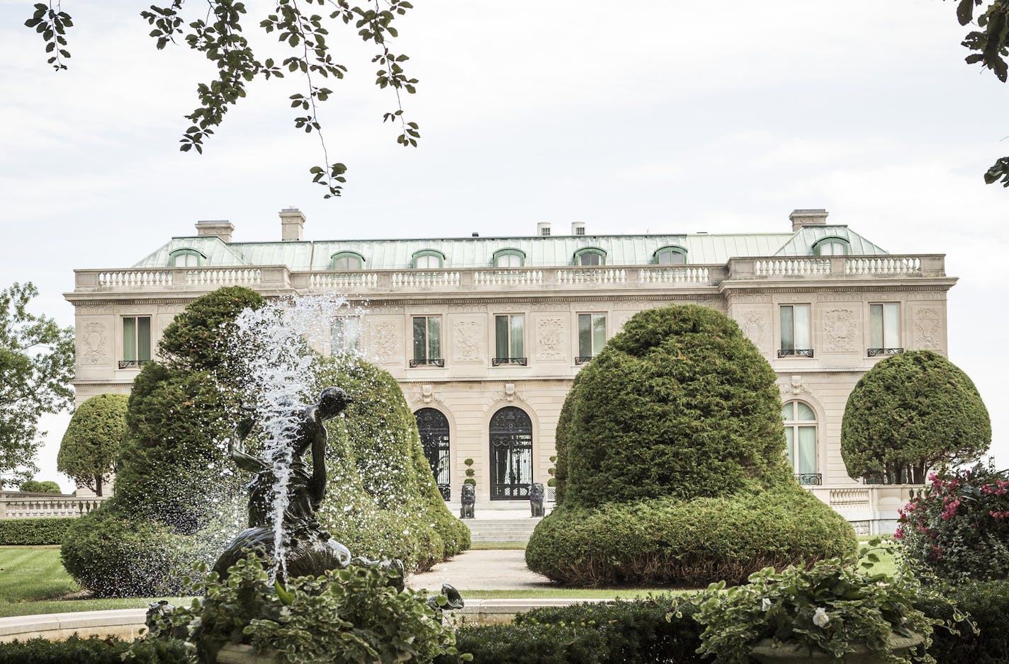 The luxurious mansions of Newport, R.I., form the backdrop for "The Maze at Windermere." New York Times