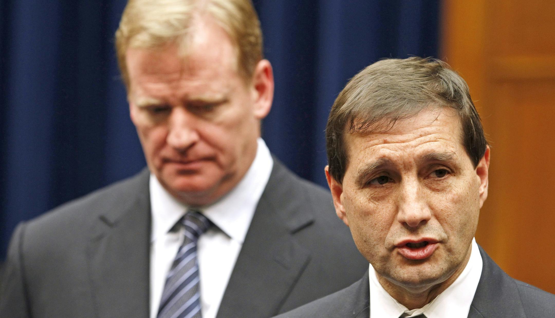 FILE - In this Oct. 14, 2011, file photo, NFL football lead counsel Jeff Pash, right, accompanied by NFL Commissioner Roger Goodell, speaks with reporters on Capitol Hill in Washington, after a meeting to discuss HGH testing for NFL players. The two NFL owners overseeing the investigation into how the league pursued and handled evidence in the Ray Rice domestic violence case pledged Thursday, Sept. 11, 2014 to make the findings of the probe public, and said their goal was "to get the truth." (AP