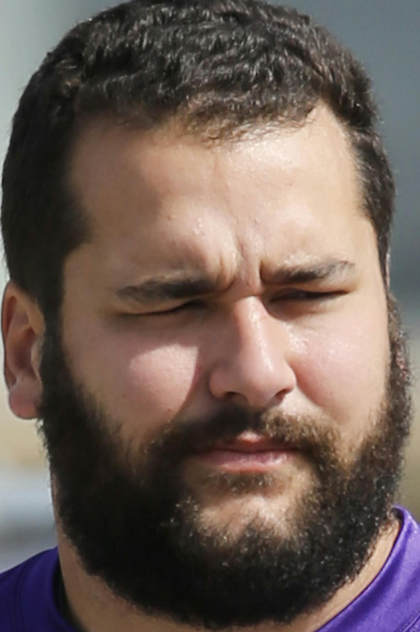 Minnesota Vikings tackle Matt Kalil walks to the practice fields at an NFL football training camp on the campus of Minnesota State University Sunday, July 26, 2015, in Mankato, Minn. (AP Photo/Charles Rex Arbogast)