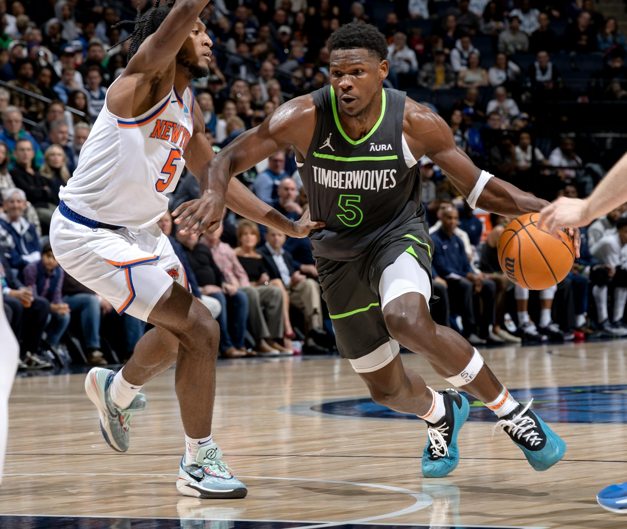 Anthony Edwards (5) of the Minnesota Timberwolves is defended by Immanuel Quickley (5) of the New York Knicks in the third quarter Monday, November 20, 2023, at Target Center in Minneapolis, Minn. ] CARLOS GONZALEZ • carlos.gonzalez@startribune.com