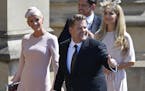 James Corden and his wife Julia Carey arrive for the wedding ceremony of Prince Harry and Meghan Markle at St. George's Chapel in Windsor Castle in Wi