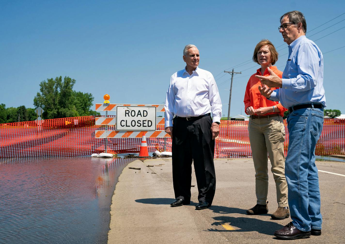 (CORRECTS LOCATION AND ID OF AG COMMISSIONER) Minnesota Governor Mark Dayton, left, and Minnesota Senator Tina Smith spoke with Commissioner of the Minnesota Department of Agriculture David Frederickson in Currie, MN, one of the hardest hit areas in recent flooding in Southwestern Minnesota. ] GLEN STUBBE &#x2022; glen.stubbe@startribune.com Friday, July 6, 2018 On Friday, Gov. Mark Dayton visits southern Minnesota cities hit hardest by rainfall and flooding earlier this week. No one has calcula