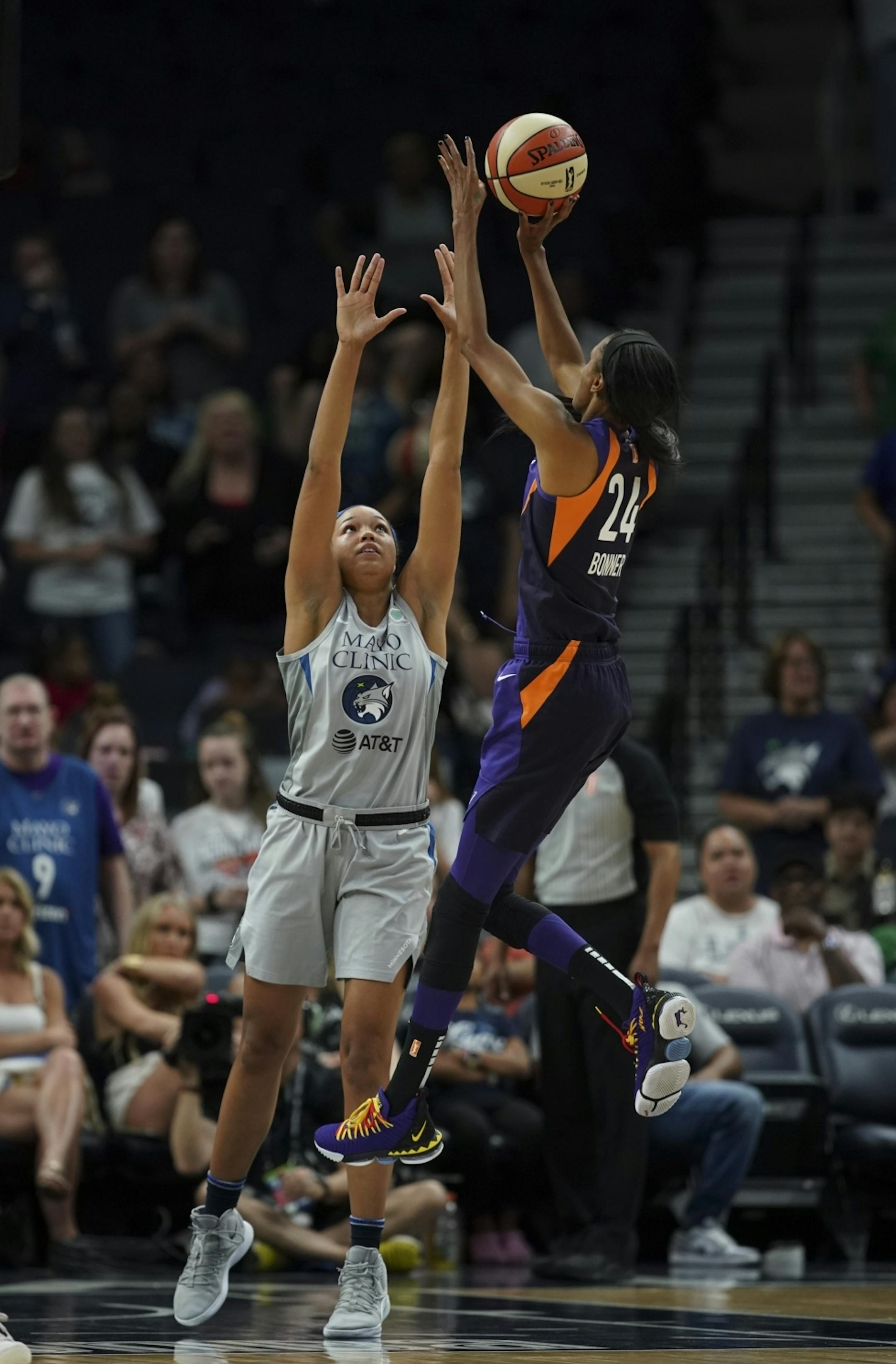 Phoenix Mercury forward DeWanna Bonner (24) shot over Minnesota Lynx forward Napheesa Collier late in the fourth quarter. She led all scorers with 25 points.