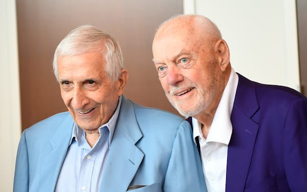 Sid Hartman posed for a photo beside close friend and former Vikings head coach Bud Grant in 2018.
