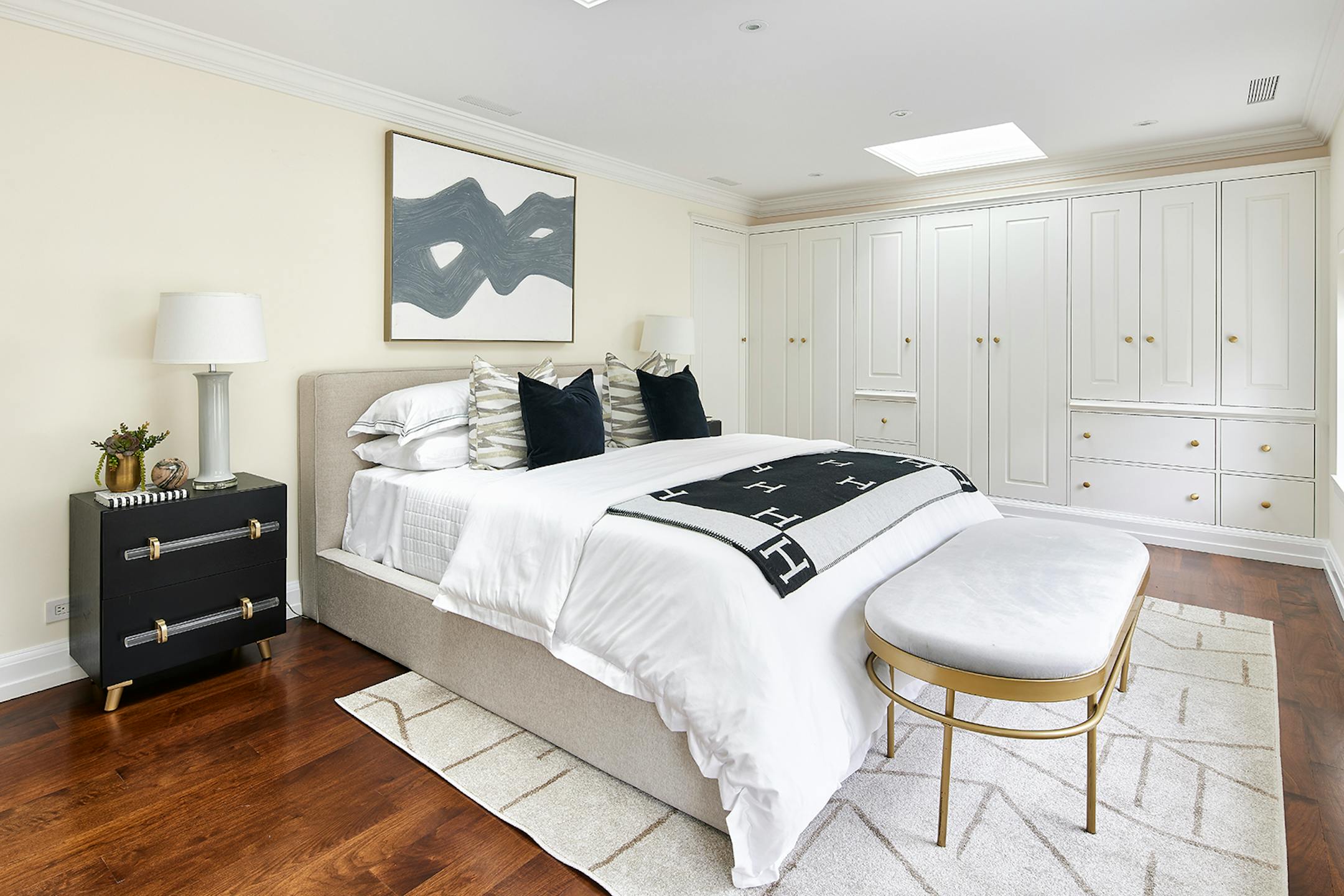 A velvet bench adds a finishing touch of elegance to this bedroom. (Handout/TNS)