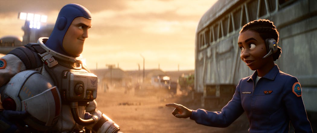 Buzz Lightyear (voiced by Chris Evans) with his longtime commander Alisha Hawthorne (voiced by Uzo Aduba) in “Lightyear.”