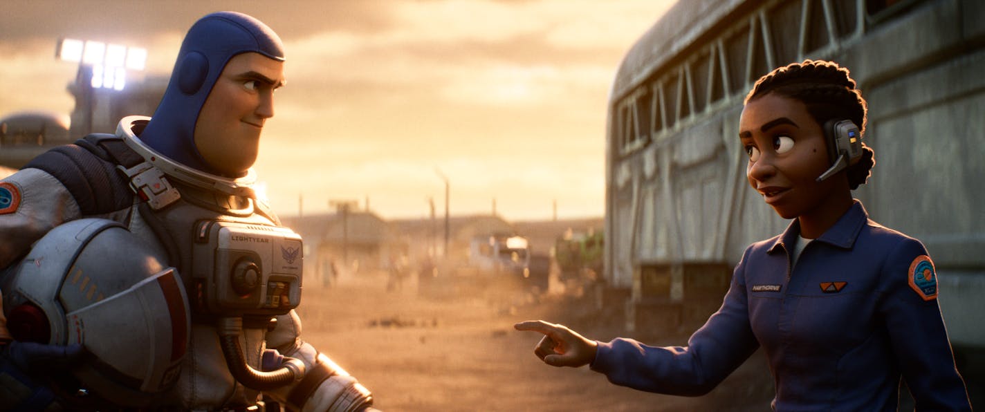 MAKING SPACE – In Disney and Pixar's "Lightyear," Buzz Lightyear (voice of Chris Evans) and Alisha Hawthorne (voice of Uzo Aduba)—his long-time commander, fellow Space Ranger and trusted friend—are marooned on a hostile planet. Directed by Angus MacLane (co-director "Finding Dory") and produced by Galyn Susman ("Toy Story That Time Forgot"), the sci-fi action-adventure opens in U.S. theaters on June 17, 2022. © 2022 Disney/Pixar. All Rights Reserved.