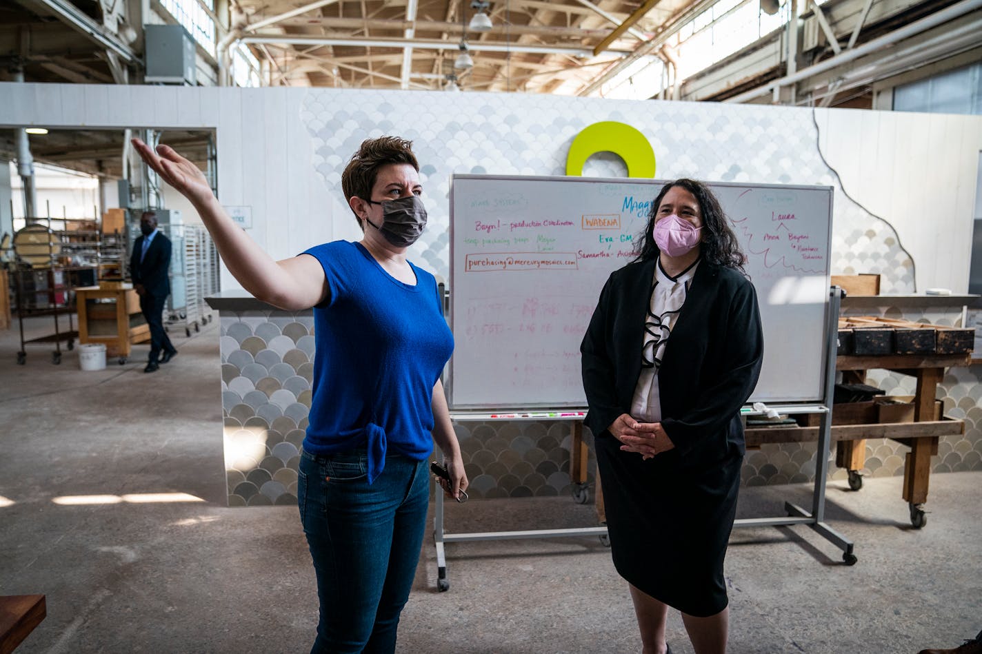 Mercury Mosaics owner Mercedes Austin, left, gave a tour of her handmade tile studio to Isabella Casillas Guzman, administrator of the U.S. Small Business Administration. ] LEILA NAVIDI • leila.navidi@startribune.com