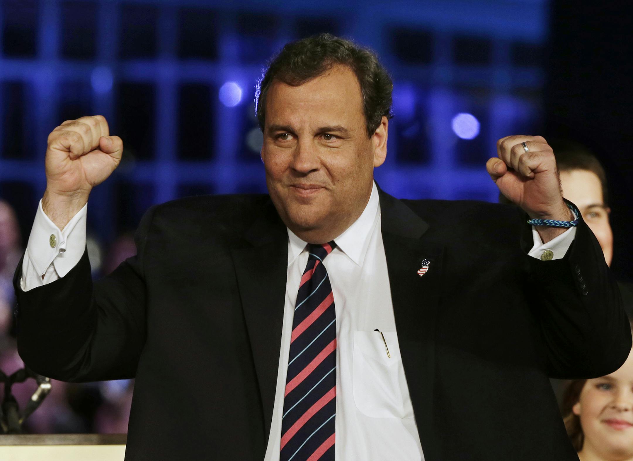 FILE - In this Nov. 5, 2013 file photo, Republican New Jersey Gov. Chris Christie celebrates his election victory in Asbury Park, N.J., after defeating Democratic challenger Barbara Buono. A dominant re-election victory in hand, New Jersey Gov. Chris Christie is charging forward on a path to bolster his resume as a get-it-done Republican leader while broadening a national network of political allies, an aggressive course designed to strengthen Christie‚Äôs appeal as he weighs a