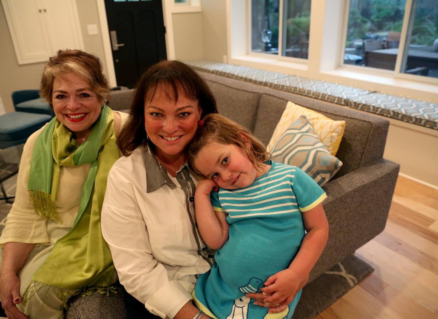 Paula Ogg, left, with her daughter Katy McArron and granddaughter Betsy. Katy and Betsy live in the renovated lower-level &#x201c;condo&#x201d;, and Ogg lives upstairs. The arrangement makes it easy for the family to help each other and spend time together.