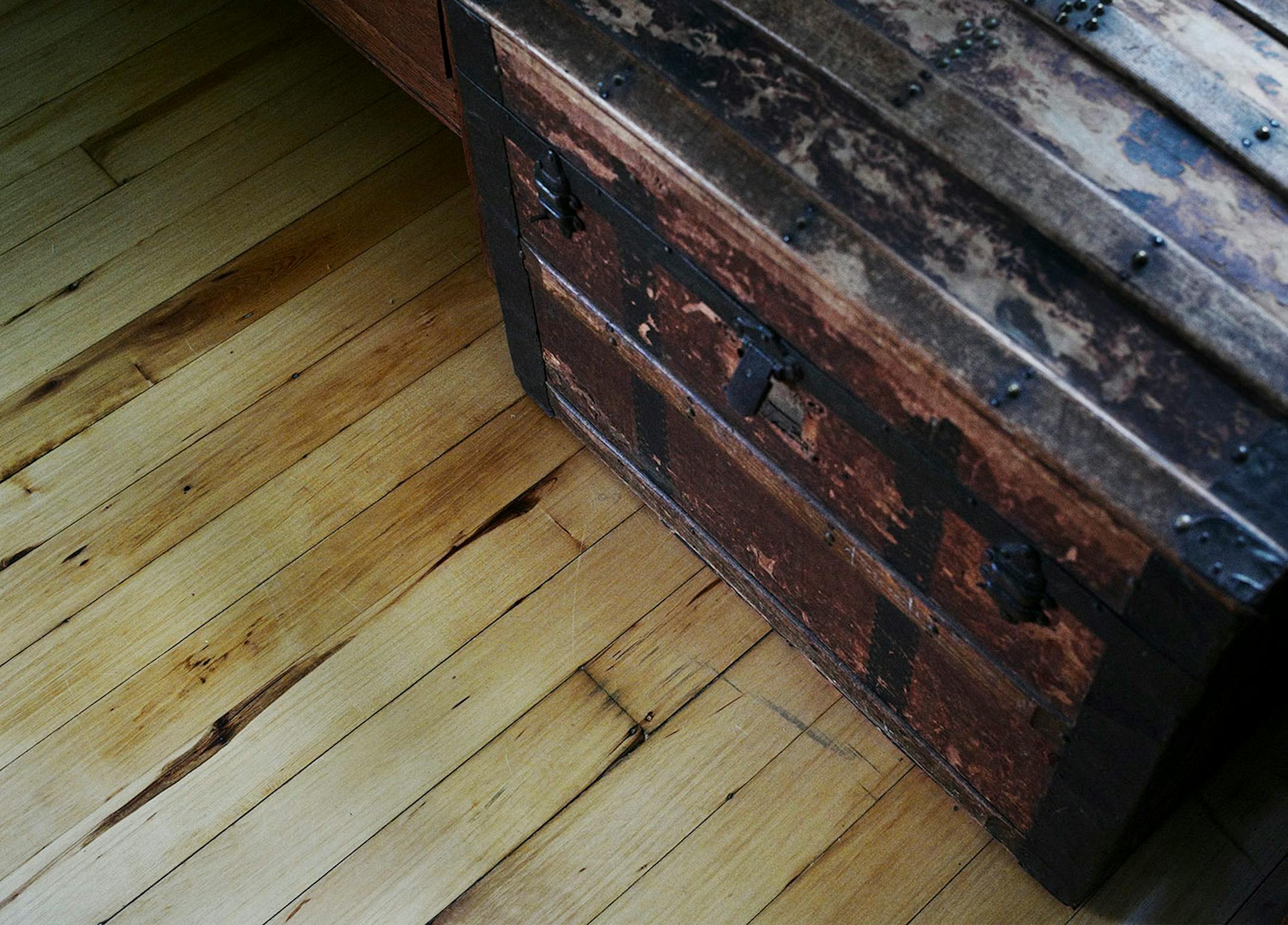 Hardwood floors were hidden under old linoleum and carpet.
