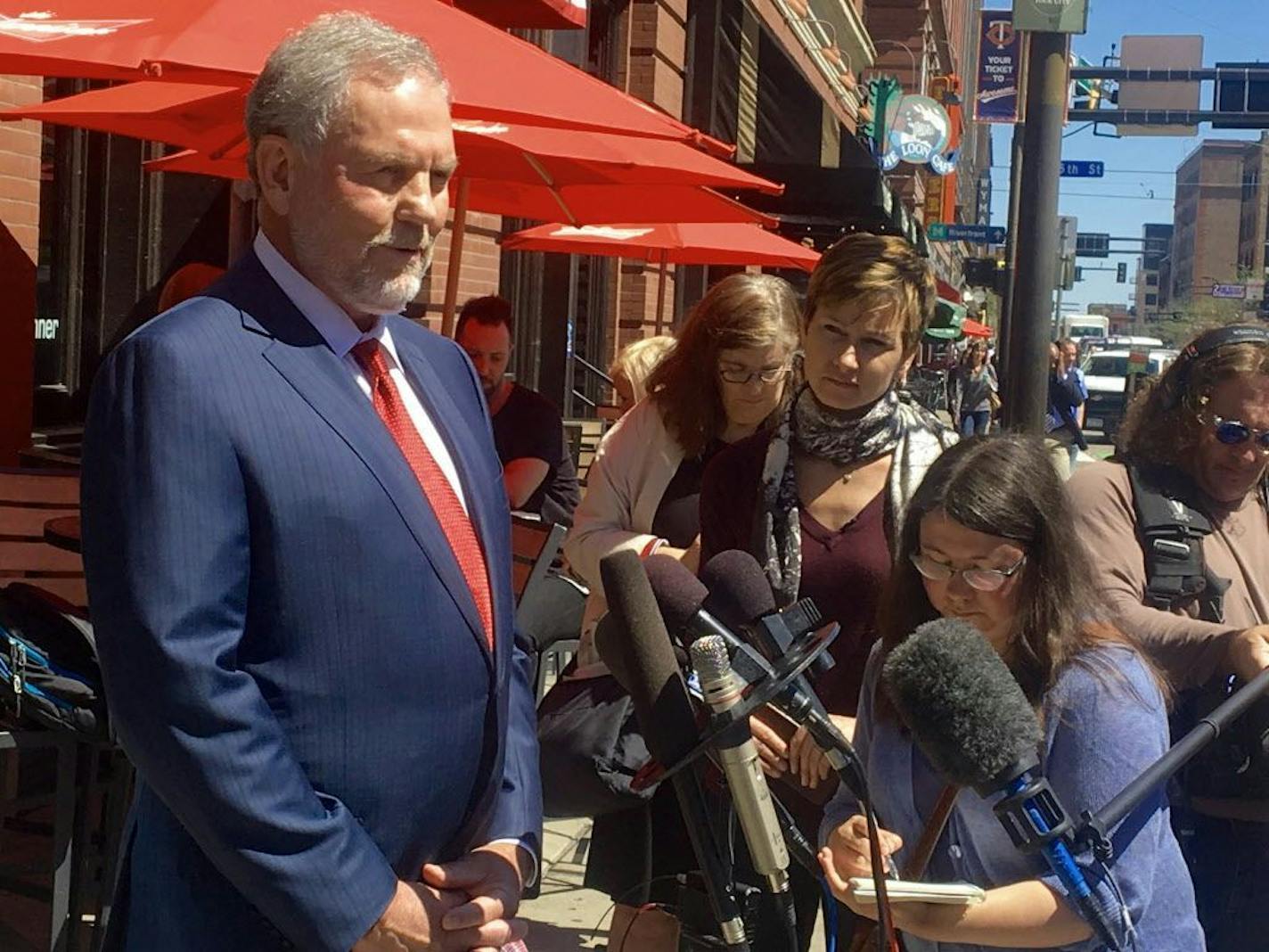 Attorney William Mauzy answers questions from the media as he arrives at his Minneapolis office Wednesday, May 4, 2016.