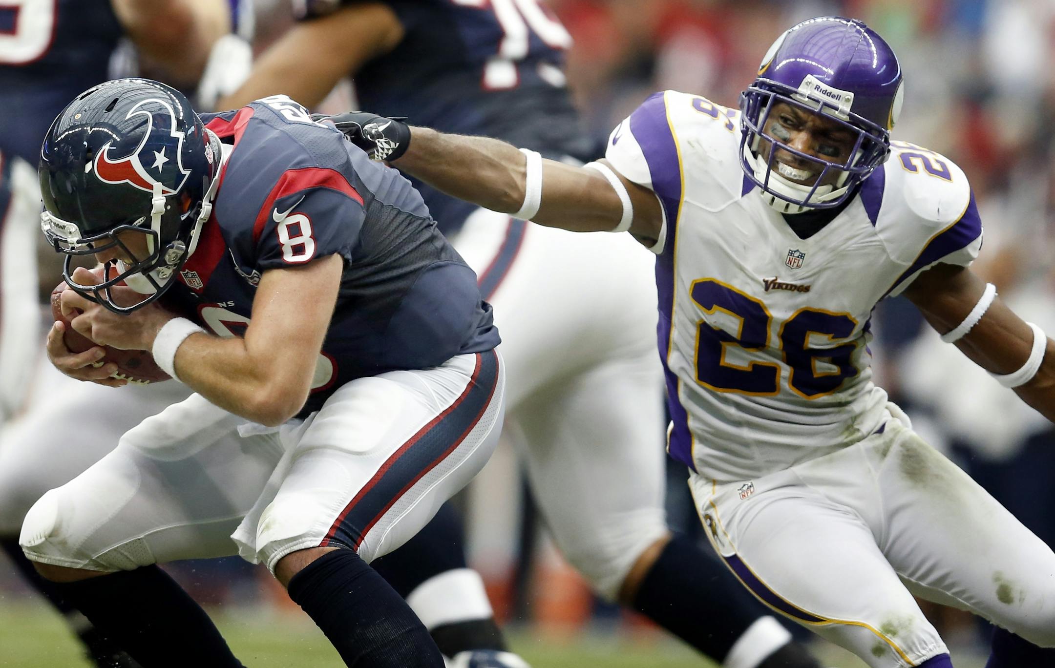 Antoine Winfield (26) sacked Matt Schaub (8) in the second quarter. Minnesota beat Houston by a final score of 23-6.