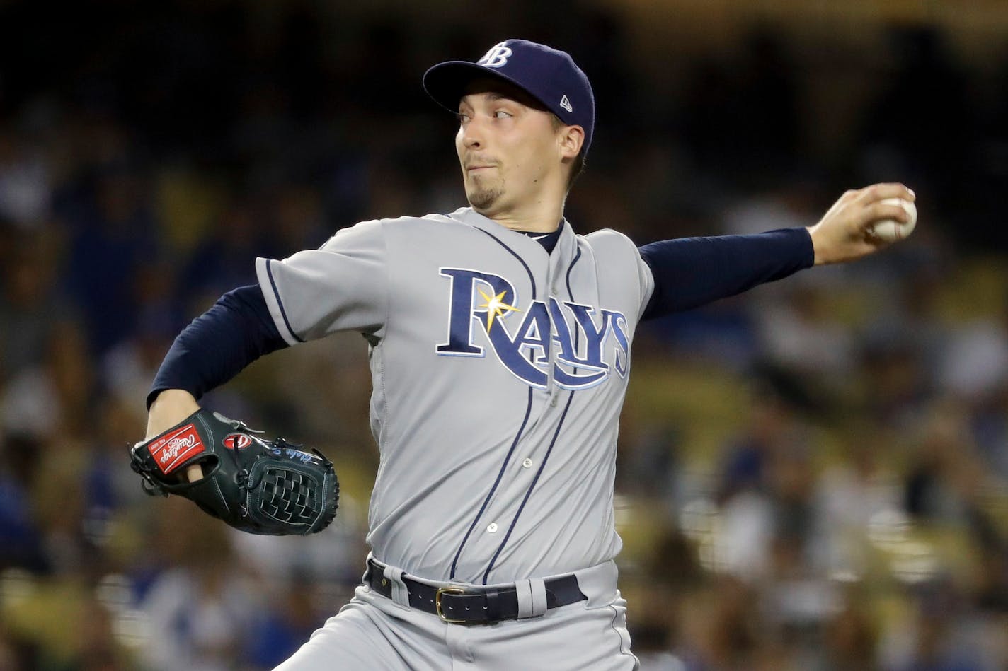 Tampa Bay Rays pitcher Blake Snell might be a too-easy symbol of player greed when he says he's not willing to take less than a prorated salary to play in a shortened baseball season, but he's also risking his health by coming back during the coronavirus era.