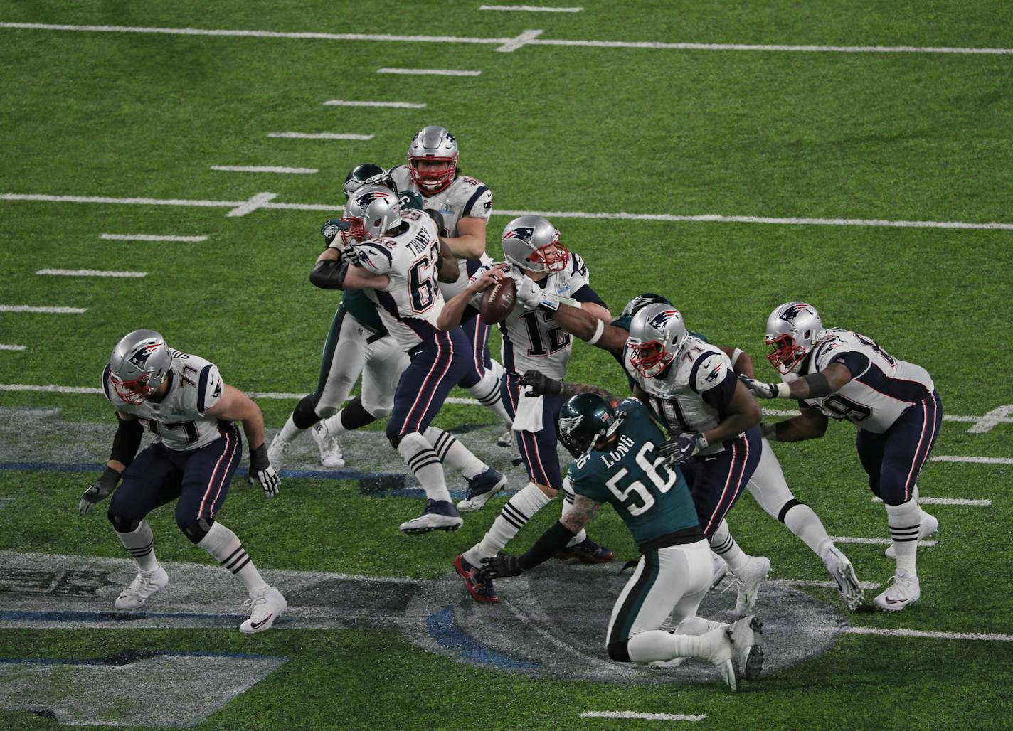 Eagles defensive end Brandon Graham knocked the ball out of Patriots quarterback Tom Brady's hands. The loose ball was recovered by Derek Barnett.