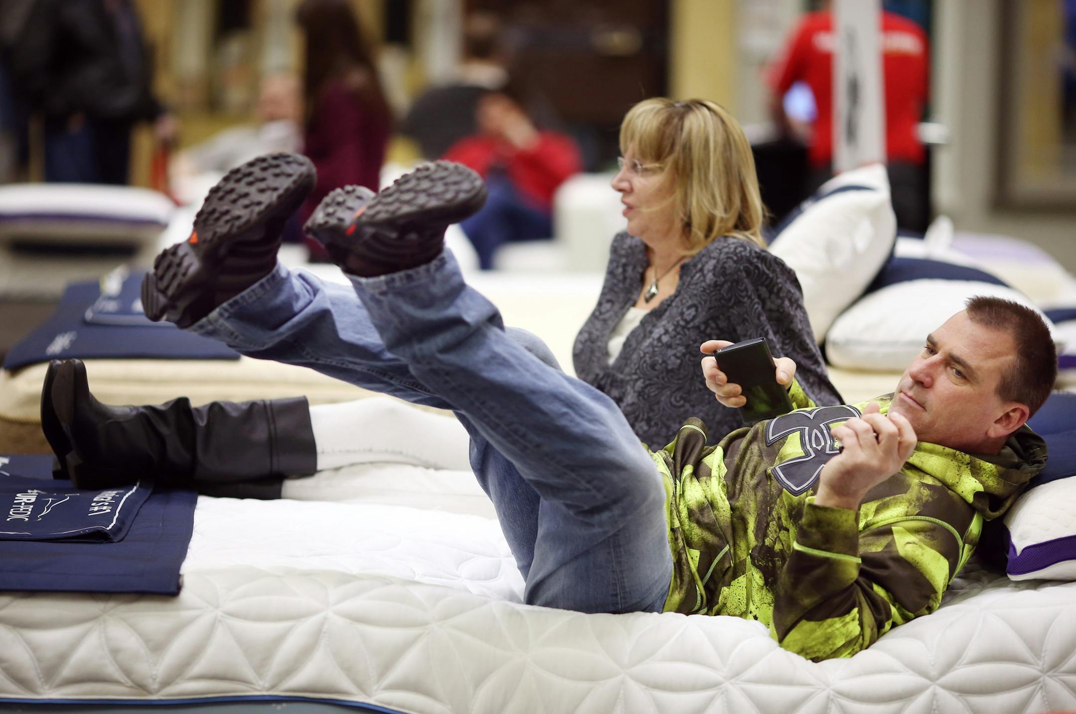 Tracy Zins right and his girlfriend Teri Bauer checked out at bed at the Mattress Firm booth during the Home and the Garden Show at the Minneapolis Convention Center Sunday March 6, 2016 in Minneapolis, MN.