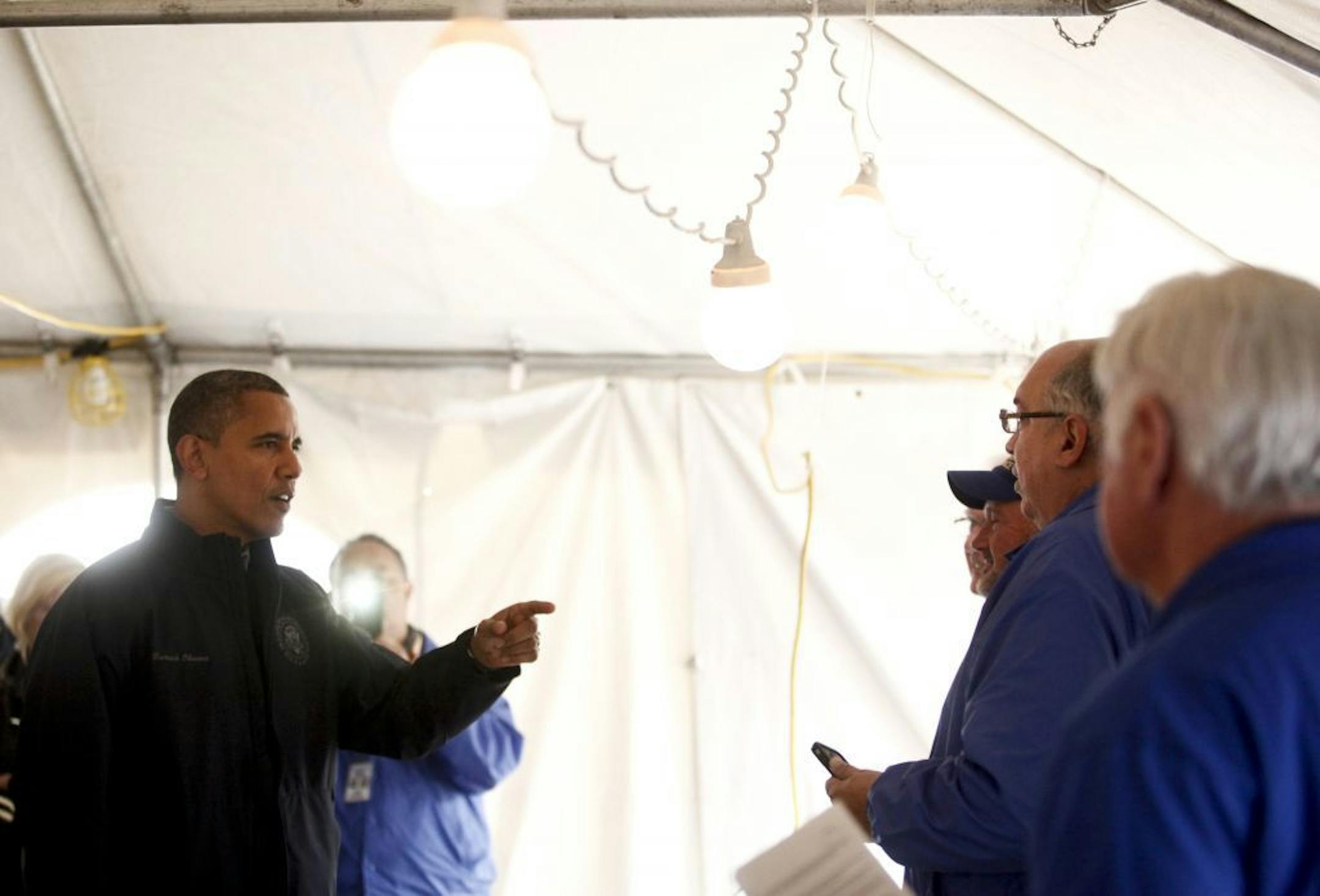 President Barack Obama speaks with citizens affected by Hurricane Sandy at a relief center in the Staten Island borough of New York, Nov. 15, 2012. Obama is expected to also stop by a Small Business Administration tent and greet a line of disaster workers from FEMA Corps.