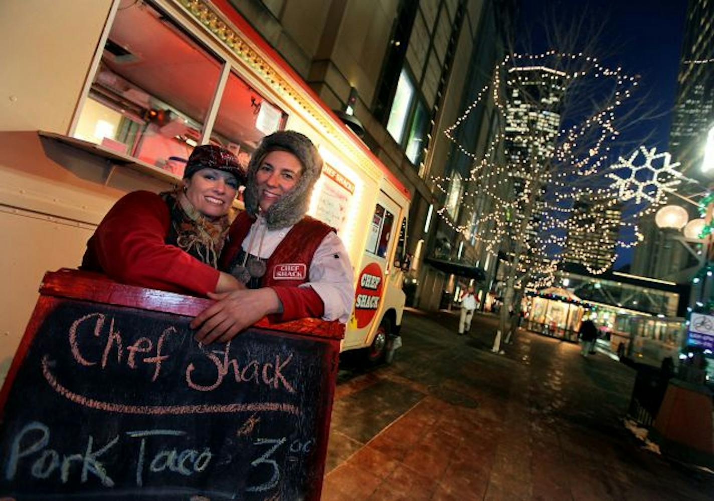 Chef Shack owners Lisa Carlson, left, and Carrie Summer operated their stand during Holidazzle on Nicollet Mall.