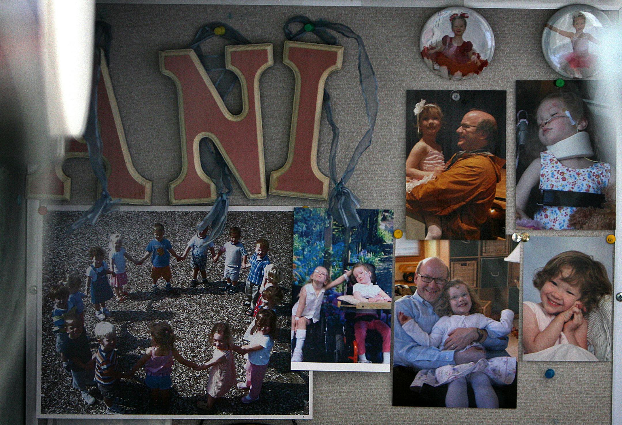 A bulletin board in at Gillette Children's Hospital shows photographs of Annika Prindle and her father, Jerry.