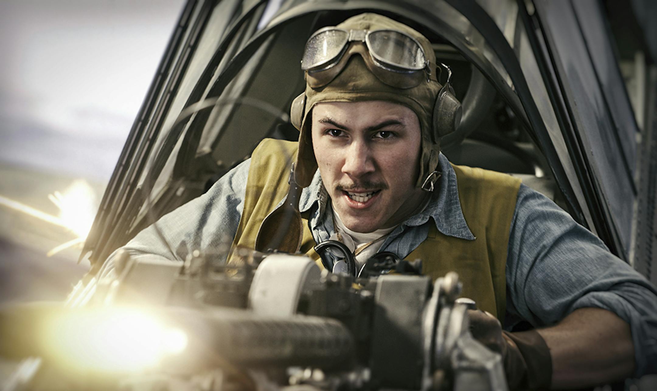 This image released by Lionsgate shows Nick Jonas in a scene from "Midway." (Reiner Bajo/Lionsgate via AP)