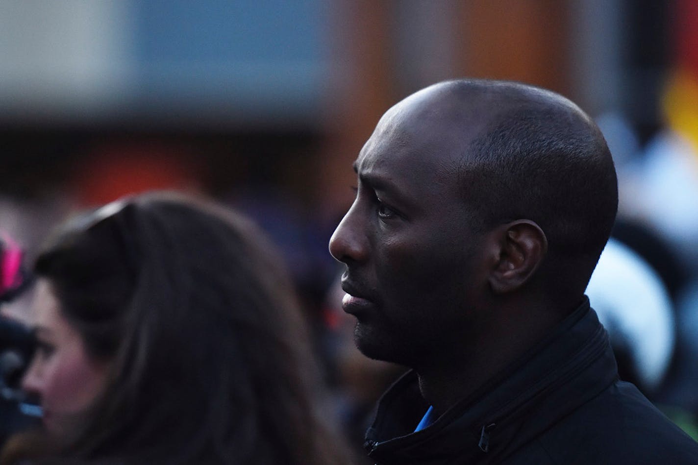 City Council candidate Mohamud Noor listed to activist peaches at Peavey Plaza.