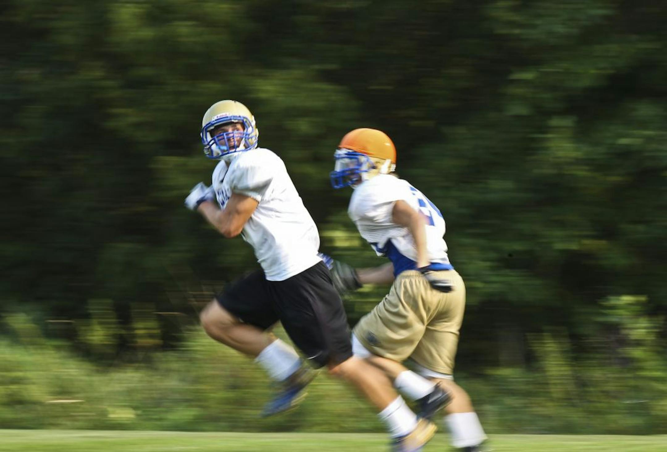 Few defensive backs can stay with Wayzata's Jeff Borchardt, left, one of four outstanding receivers in the Lake Conference. He possesses 4.5-second speed in the 40-yard dash.