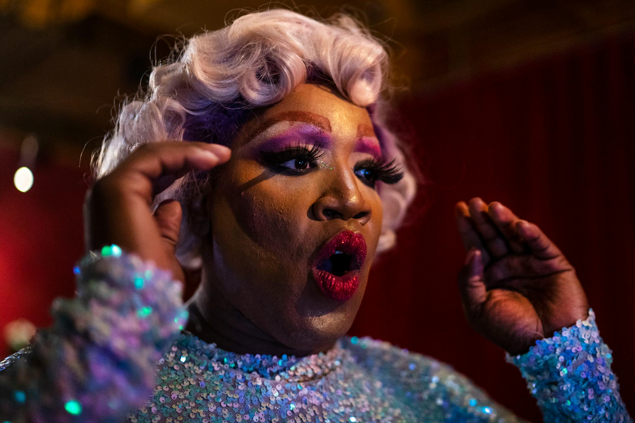 Sasha Cassadine reacts to seeing his full make-up in the mirror before performing at a weekly drag show hosted by Flip Phone Events At Crave on Sunday, June 20, 2021, in Minneapolis. Cassadine has been performing for 15 years. ] ANTRANIK TAVITIAN • anto.tavitian@startribune.com
