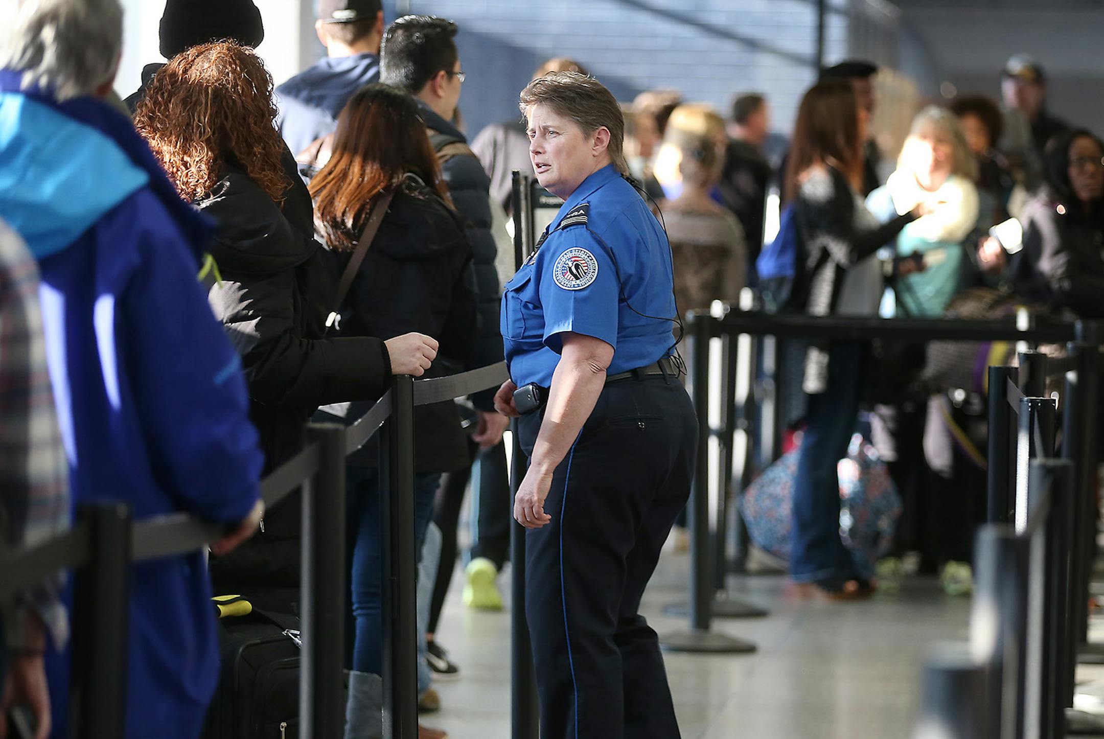 TSA security moved people through the security line at Terminal one at Minneapolis/St. Paul International Airport, Friday, March 11, 2016 in Bloomington, MN. ] (ELIZABETH FLORES/STAR TRIBUNE) ELIZABETH FLORES &#x2022; eflores@startribune.com ORG XMIT: MIN1603111037460891
