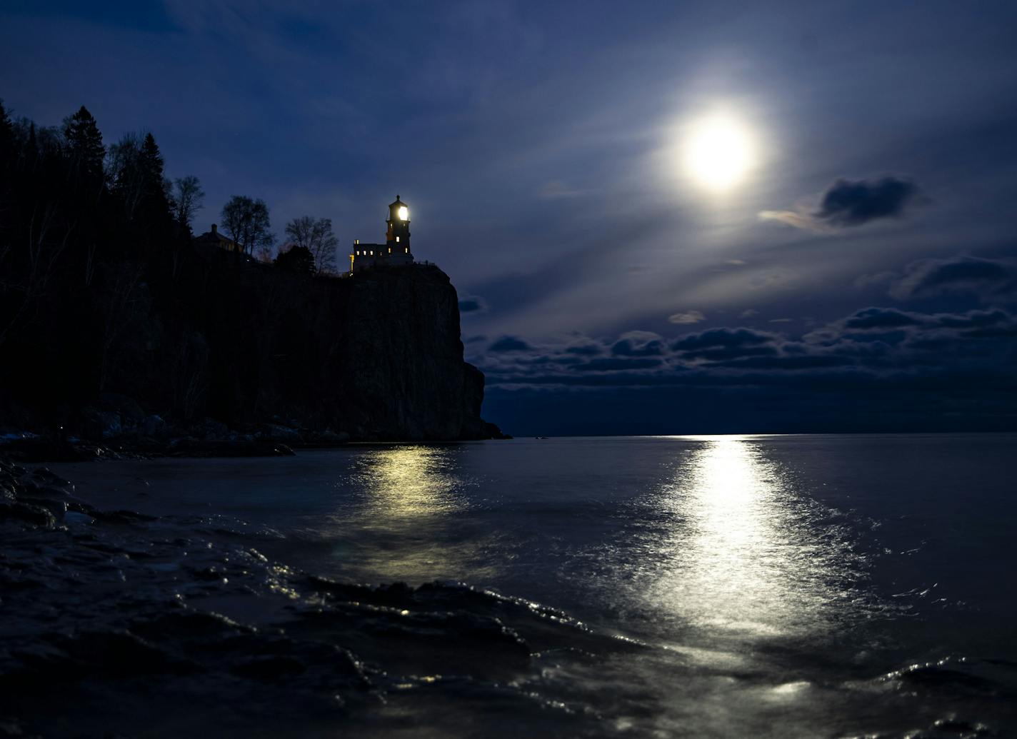 A bright moon shone over the horizon near the Split Rock Lighthouse on Sunday, Nov. 10. It was lit to honor the lives of the 29 men that died aboard the Edmund Fitzgerald 44 years ago.