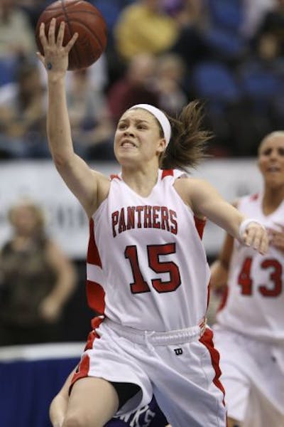 Lakeville's Rachel Banham put up two of her eleven first half points as she was fouled Thursday night.