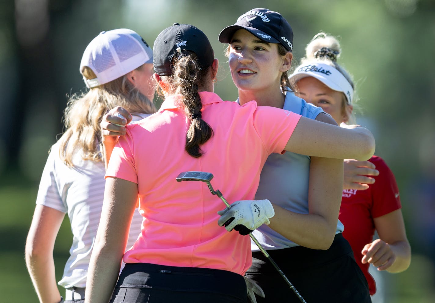 Kathryn VanArragon gets a hug after her round Wednesday, June 15, 2022 at Bunker Hills Golf Club in Coon Rapids, Minn. ] CARLOS GONZALEZ • carlos.gonzalez@startribune.com