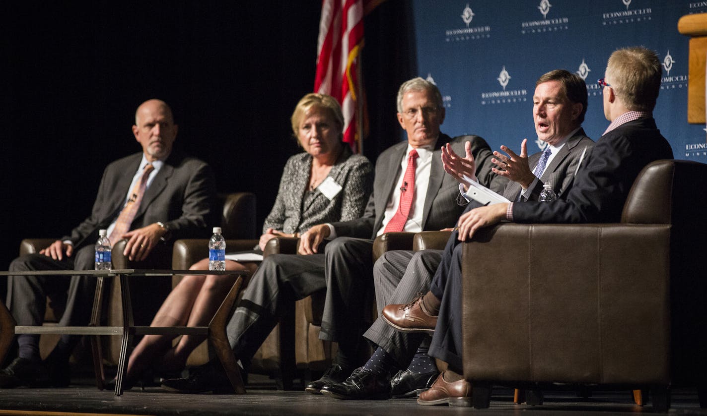 Jeff Harmening, General Mills' Chief Operating Officer, from left, Sally Smith, Buffalo Wild Wings' CEO, Greg Page, Cargill director and the company's former CEO and Jeffrey Ettinger, Hormel's CEO speak on a panel titled the "War on Big Food" during event organized by the Economic Club of Minnesota at the Convention Center in Minneapolis on Friday, October 30, 2105. ] (LEILA NAVIDI/STAR TRIBUNE) leila.navidi@startribune.com