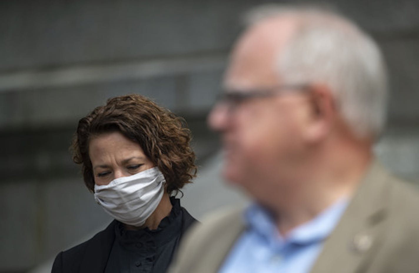 Duluth Mayor Emily Larson listened as Governor Tim Walz held a press conference in front of Duluth City Hall on Monday. He discussed the 100th anniversary of the Duluth lynchings and their connection to George Floyd's death in Minneapolis. ] ALEX KORMANN • alex.kormann@startribune.com June 15, 2020 marked the 100 year anniversary of the lynching of Elias Clayton, Elmer Jackson and Isaac McGhie in Duluth. The trio were falsely accused of raping a white woman and paid with their lives. A century l