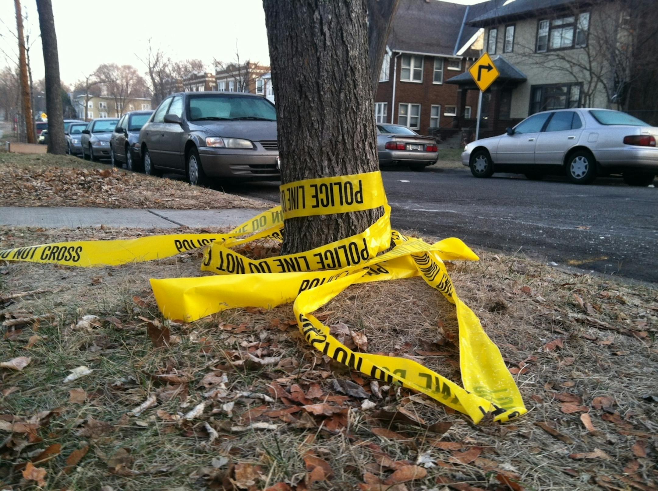 2012 photo: Police tape lies on the ground where a suspect and Minneapolis police exchanged gunfire.